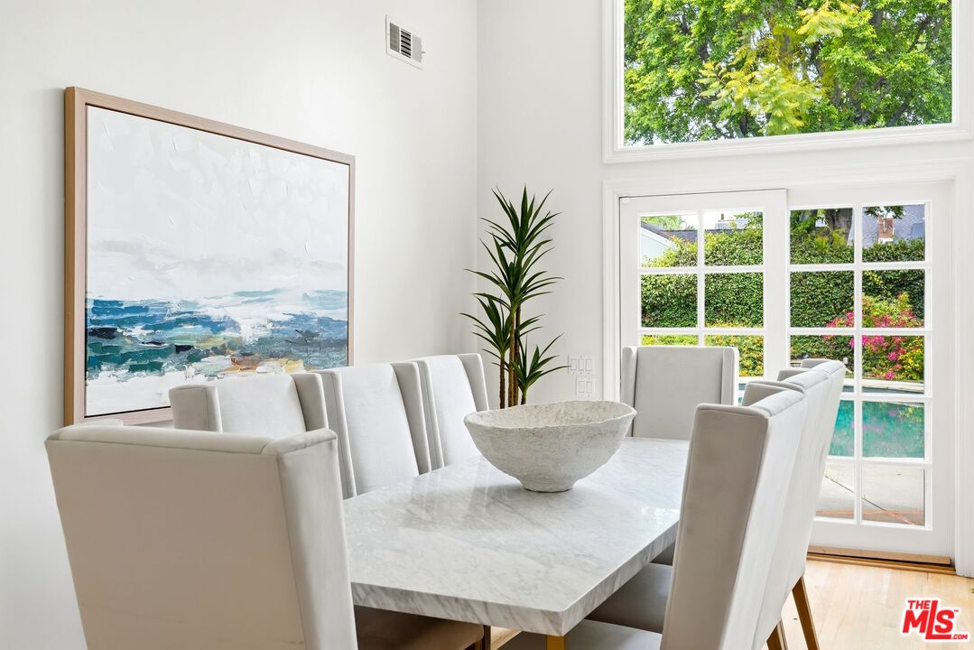 13019 Addison Street Sherman Oaks, CA 91423 - Photo 7 of 28 a view of a dining room with furniture window and outside view