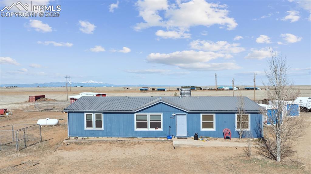 610 Awesome View Yoder, CO 80864 - Photo 3 of 43 front view of a house with a yard