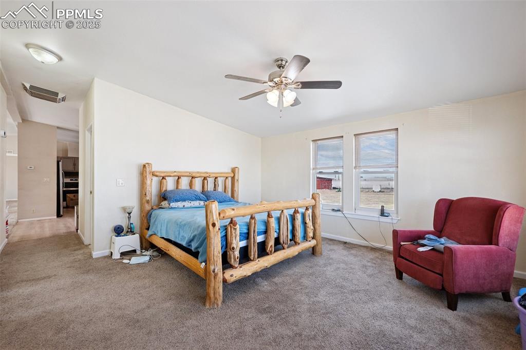 610 Awesome View Yoder, CO 80864 - Photo 43 of 43 a bedroom with a bed and a couch