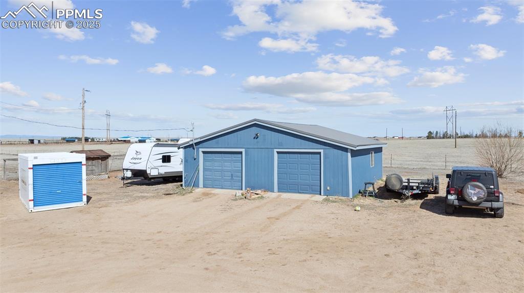 610 Awesome View Yoder, CO 80864 - Photo 8 of 43 a view of a car in front of a house