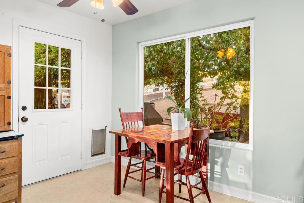 2043 Pamo Road Ramona, CA 92065 - Photo 14 of 63 a view of a dining room with furniture window and outside view
