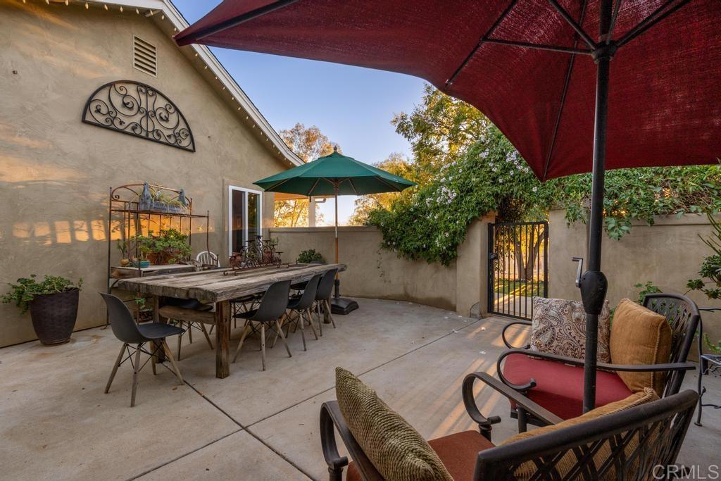 2043 Pamo Road Ramona, CA 92065 - Photo 27 of 63 a backyard of a house with table and chairs