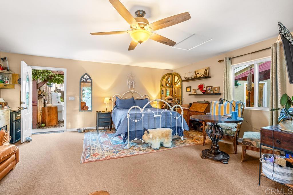 2043 Pamo Road Ramona, CA 92065 - Photo 33 of 63 a bedroom with furniture and a large window