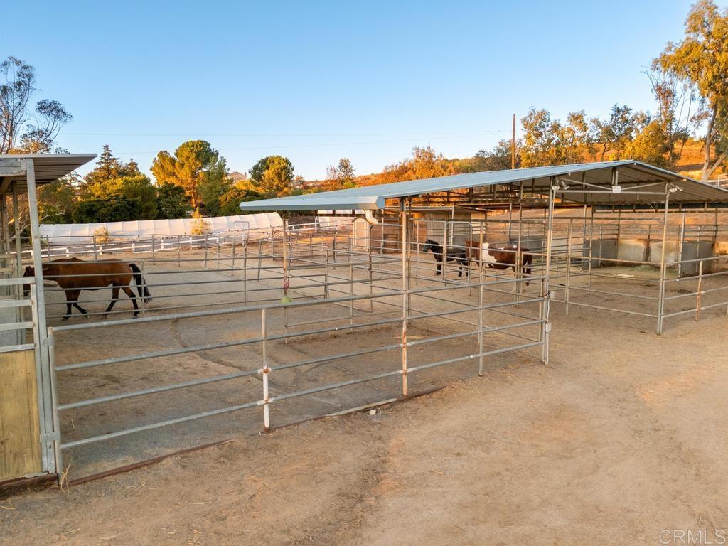 2043 Pamo Road Ramona, CA 92065 - Photo 40 of 63 a view of a chair and table on the wall
