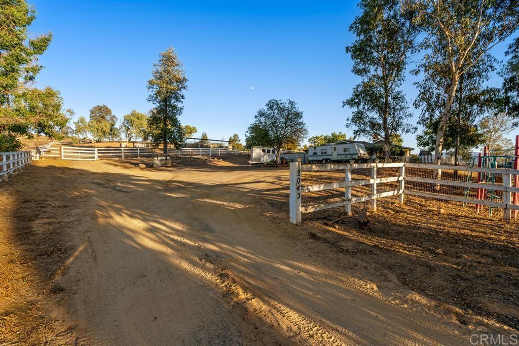 2043 Pamo Road Ramona, CA 92065 - Photo 4 of 63 a view of a street with houses