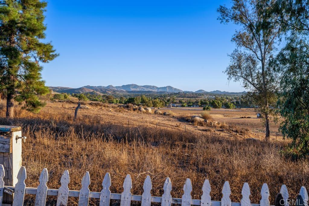 2043 Pamo Road Ramona, CA 92065 - Photo 45 of 63 a view of a lake with houses in the back