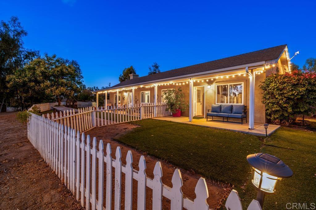 2043 Pamo Road Ramona, CA 92065 - Photo 51 of 63 a view of balcony with floor to ceiling window and potted plants