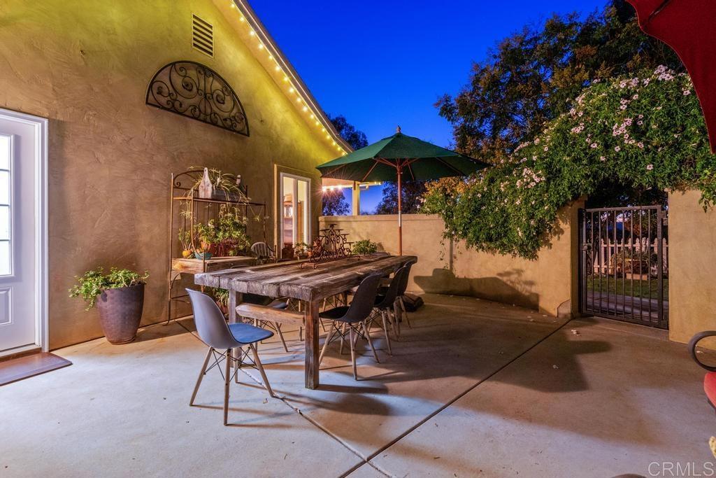 2043 Pamo Road Ramona, CA 92065 - Photo 53 of 63 a backyard of a house with table and chairs