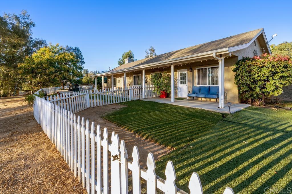 2043 Pamo Road Ramona, CA 92065 - Photo 8 of 63 a front view of a house with garden