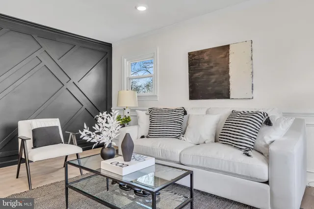 a living room with a couch and a table