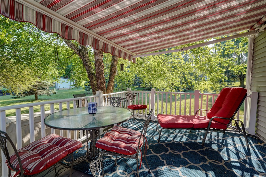 4446 Federal Road Livonia, NY 14487 - Photo 27 of 31 Deck with Electric Awning