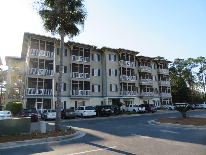 231 Somerset Bridge Road, Unit 2401 Santa Rosa Beach, FL 32459 - Photo 1 of 22 a front view of a building with street view and glass windows
