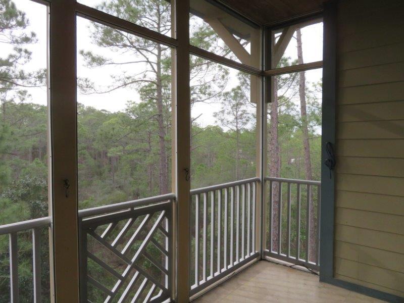 231 Somerset Bridge Road, Unit 2401 Santa Rosa Beach, FL 32459 - Photo 14 of 22 a view of a balcony with a swing