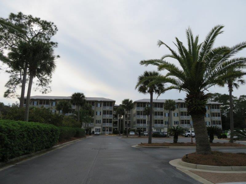231 Somerset Bridge Road, Unit 2401 Santa Rosa Beach, FL 32459 - Photo 17 of 22 a view of a street with a building and palm trees