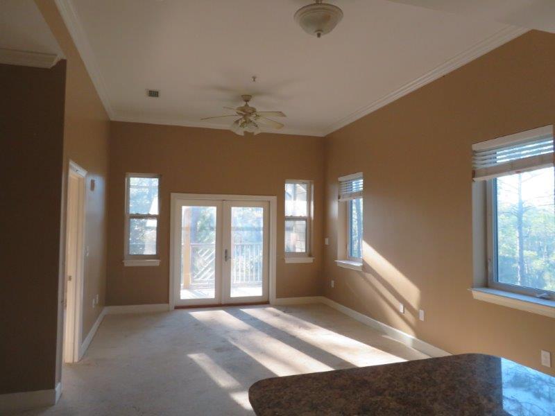231 Somerset Bridge Road, Unit 2401 Santa Rosa Beach, FL 32459 - Photo 2 of 22 a view of a livingroom with a ceiling fan and window