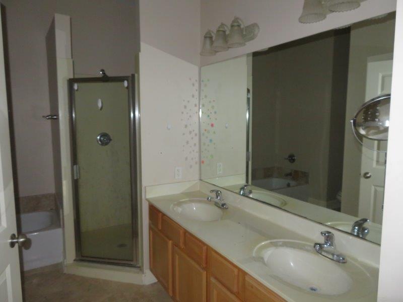 231 Somerset Bridge Road, Unit 2401 Santa Rosa Beach, FL 32459 - Photo 9 of 22 a bathroom with a sink shower and a mirror