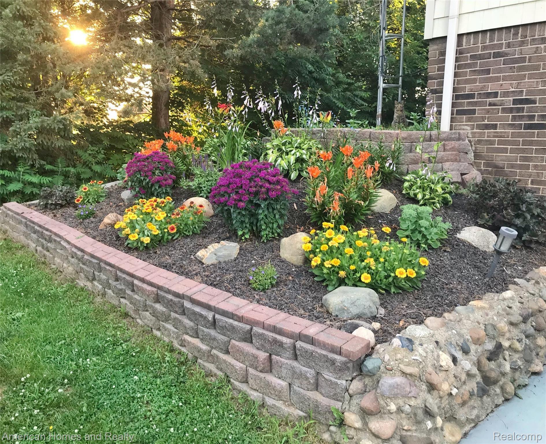 6530 Armstrong Road Imlay City, MI 48444 - Photo 56 of 59 Flower Bed on side of home