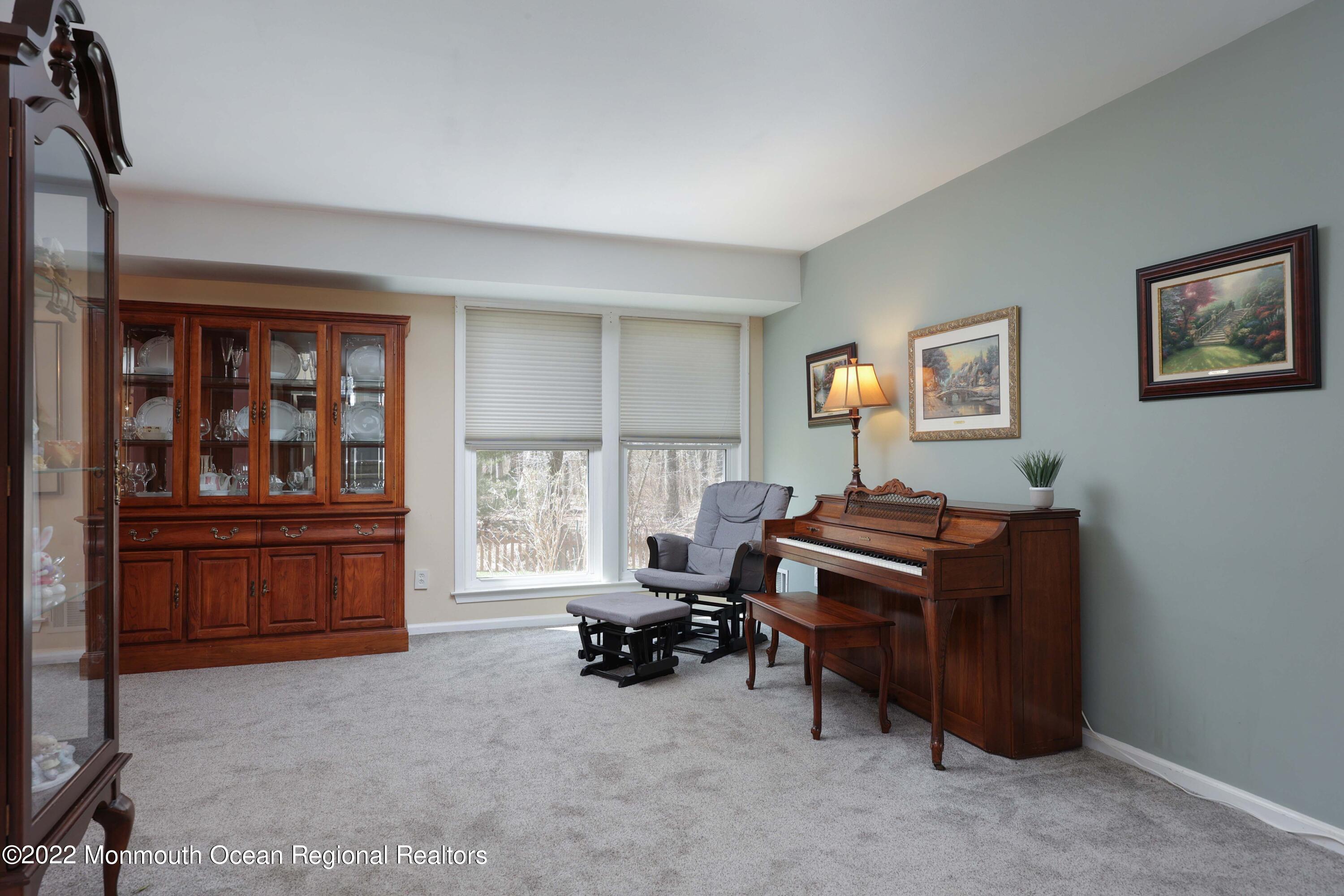 8 Reed Road Howell, NJ 07731 - Photo 7 of 22 a bed room with furniture and a window