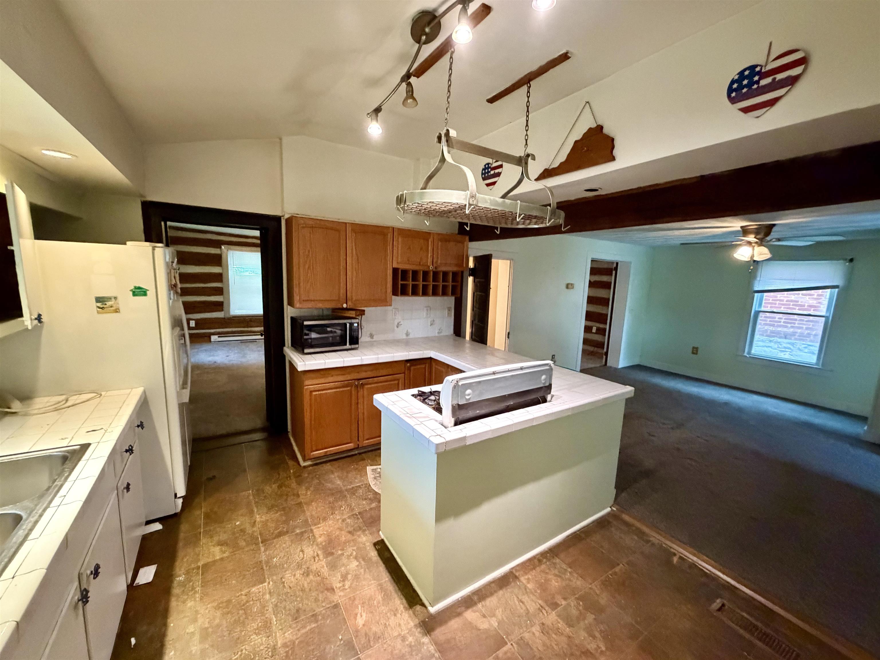 3648 Middlebrook Village Road Middlebrook, VA 24459 - Photo 10 of 48 a kitchen with stainless steel appliances granite countertop a stove and a refrigerator