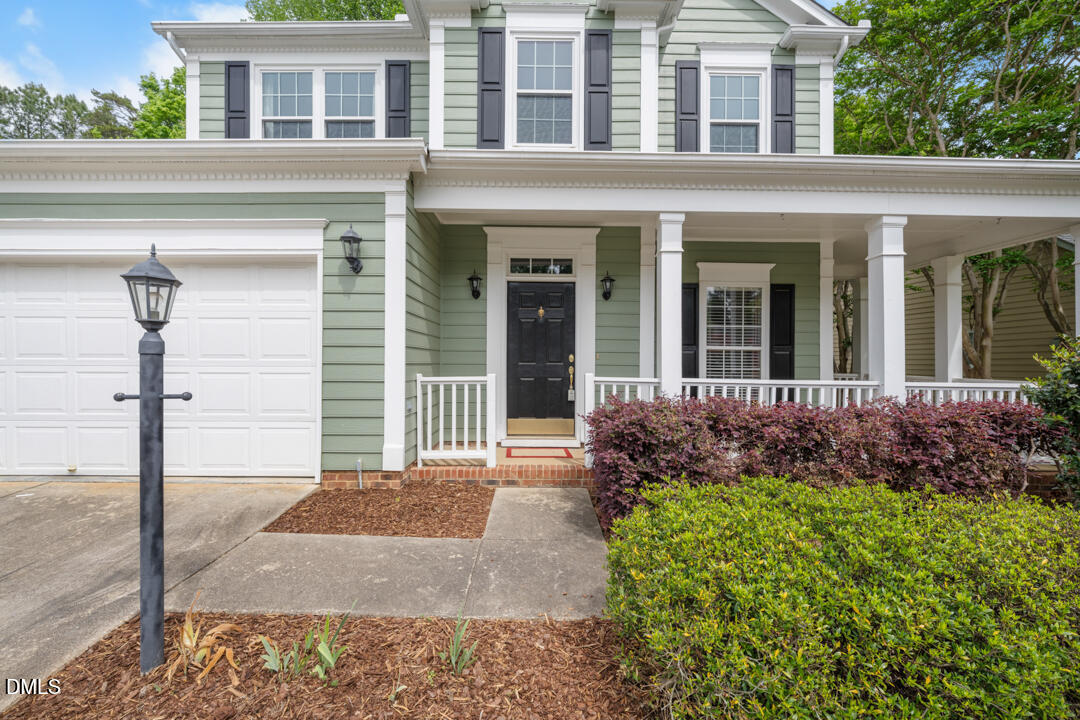 5324 Bartram Place Raleigh, NC 27617 - Photo 1 of 35 front view of a house with a yard