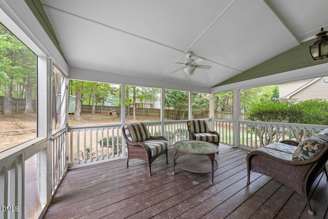 5324 Bartram Place Raleigh, NC 27617 - Photo 27 of 35 a balcony with furniture and wooden floor