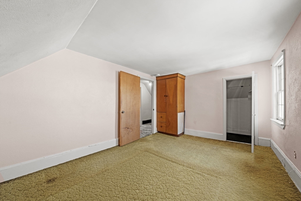 6 Cottage Street Lowell, MA 01852 - Photo 18 of 32 an empty room with closet