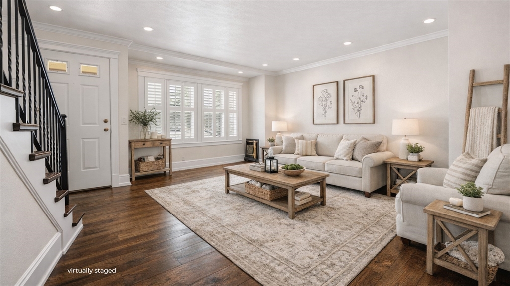 6 Cottage Street Lowell, MA 01852 - Photo 4 of 32 a living room with furniture and a rug