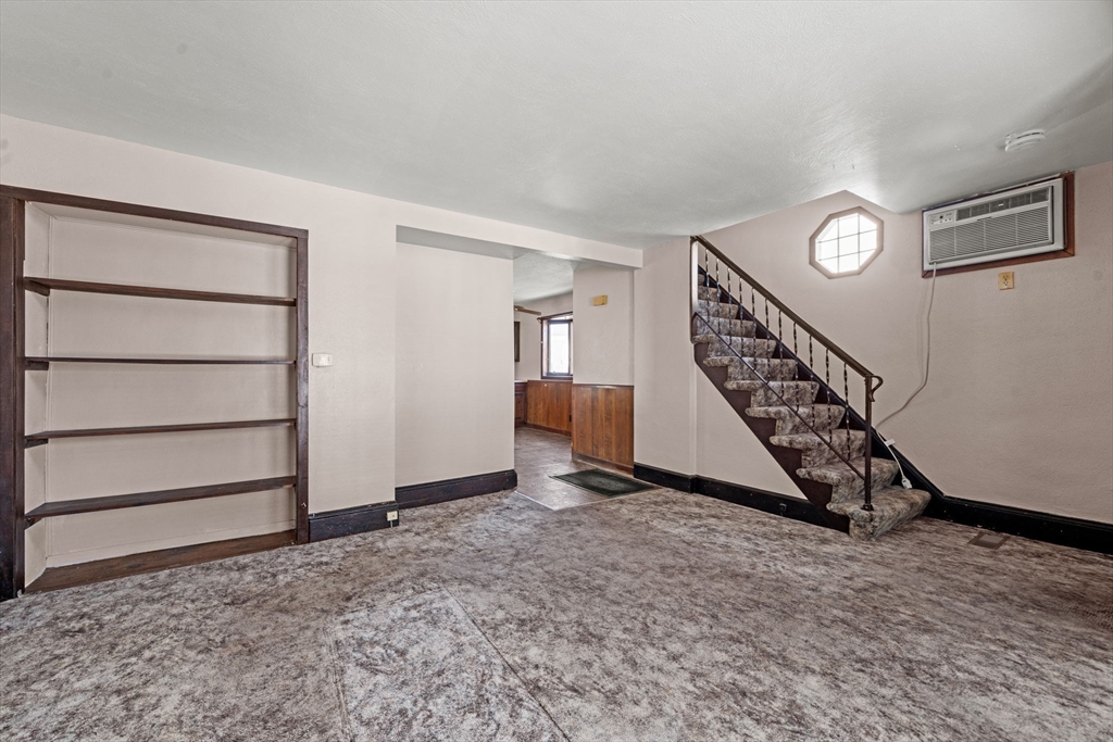 6 Cottage Street Lowell, MA 01852 - Photo 7 of 32 a view of an empty room with a window