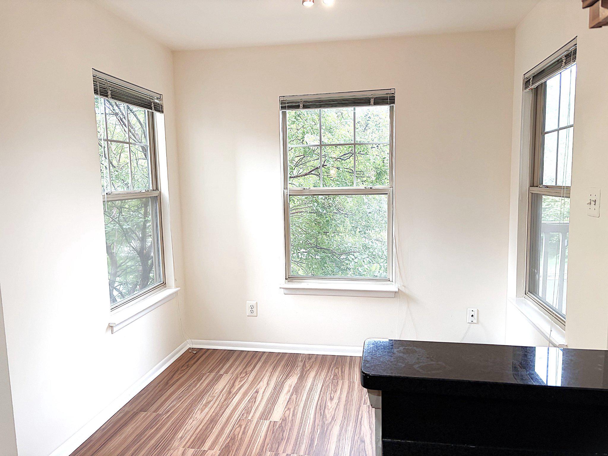 11653 Gas Light Court, Unit H Reston, VA 20190 - Photo 10 of 28 Bright and Open Dining Area with three windows