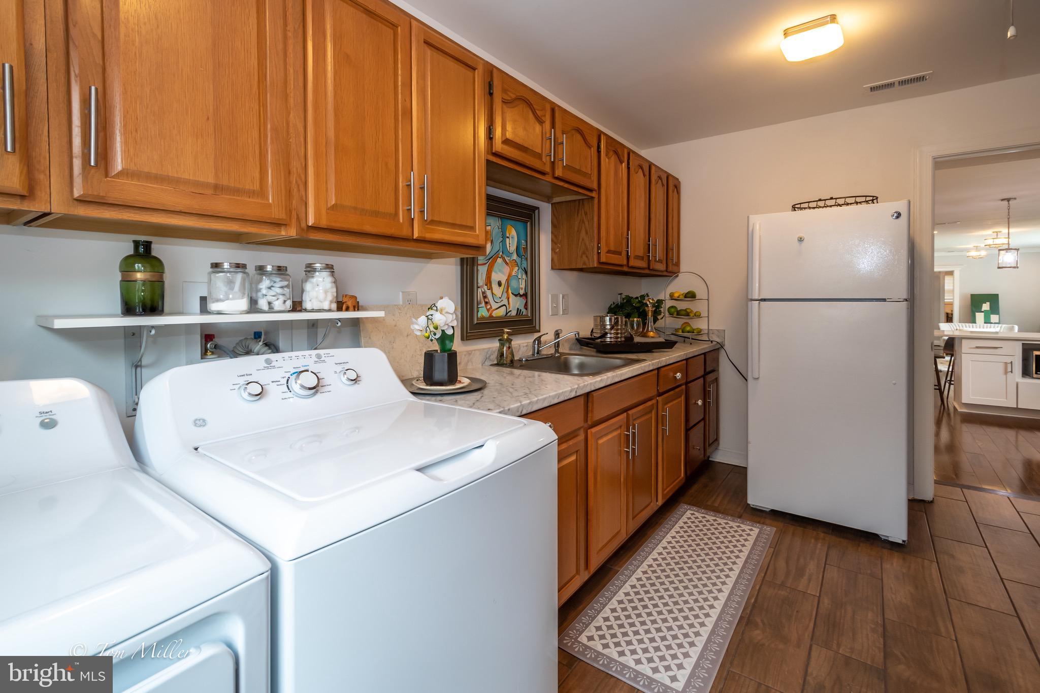 1204 Merediths Ford Road Towson, MD 21286 - Photo 38 of 49 Laundry/2nd kitchen w/cabinets, sink & disposal