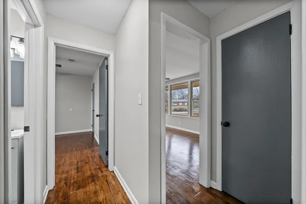 a view of a bedroom from a hallway