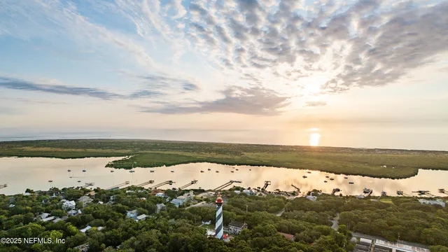 an aerial view of beach and city