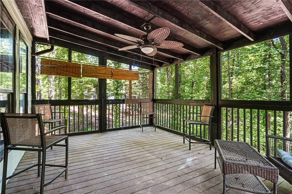 2133 Cooper Way Jonesboro, GA 30236 - Photo 41 of 46 a view of a porch with wooden floor in front of a house