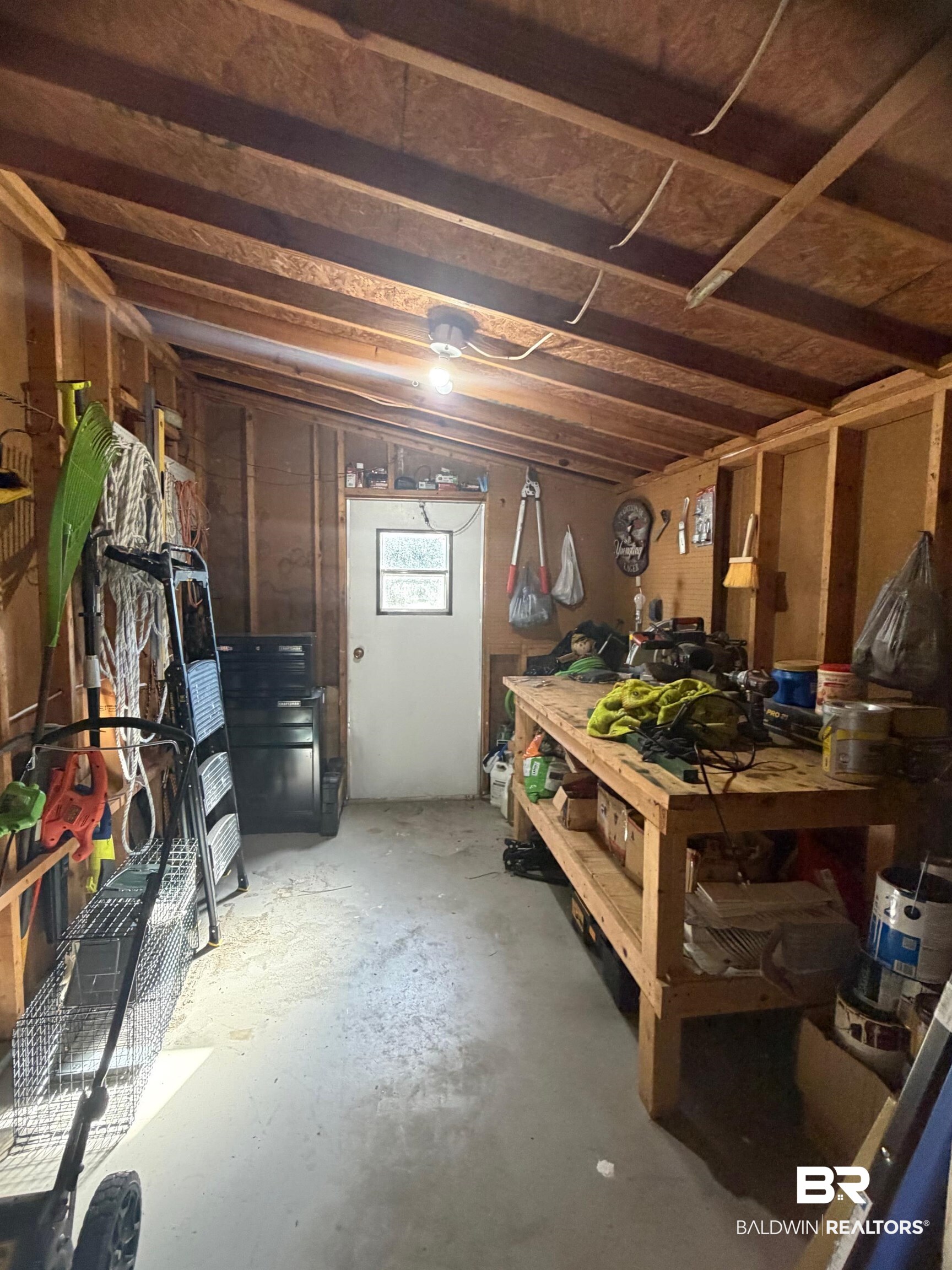 1127 Ridgewood Drive Lillian, AL 36549 - Photo 13 of 32 Basement featuring a workshop area