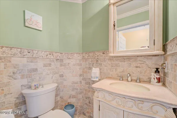a bathroom with a sink and a toilet