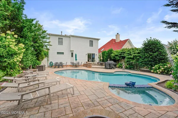 swimming pool view with a outdoor space