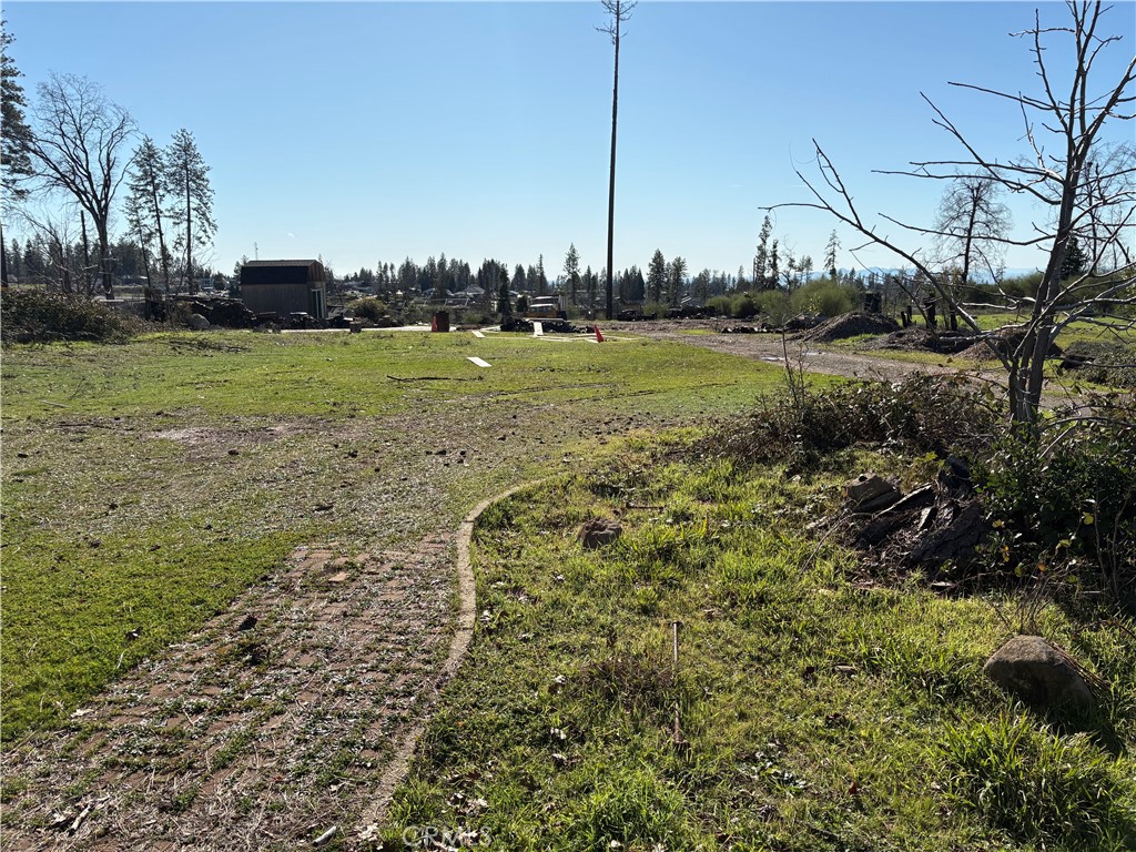 706 Bille Road Paradise, CA 95969 - Photo 3 of 5 a view of a lake with houses in the background