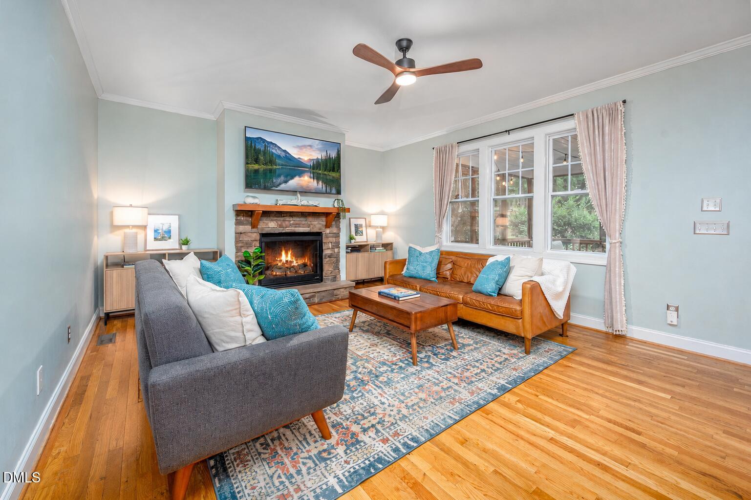 726 Ruth Circle Fuquay-Varina, NC 27526 - Photo 21 of 61 a living room with furniture and a fireplace