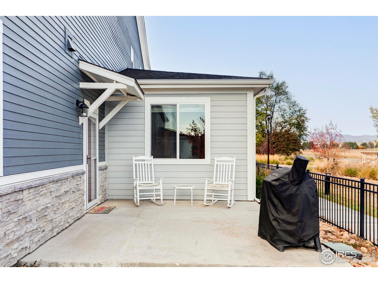 784 Stonebridge Drive Longmont, CO 80503 - Photo 3 of 35 a view of a back yard of the house