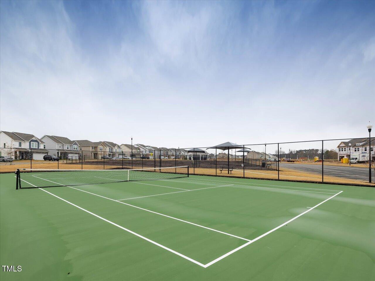 1099 Channel Drop Loop Zebulon, NC 27597 - Photo 19 of 24 a view of tennis court
