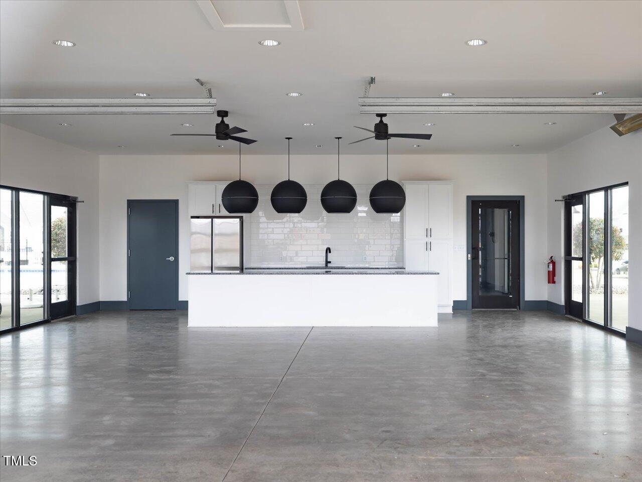 1099 Channel Drop Loop Zebulon, NC 27597 - Photo 24 of 24 a view of lobby with furniture and wooden floor
