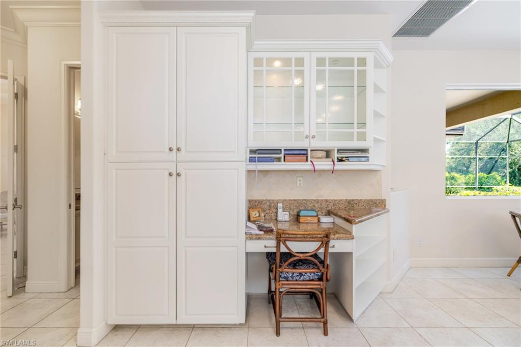 20481 Chapel Trace Estero, FL 33928 - Photo 11 of 50 a room with a table and chairs