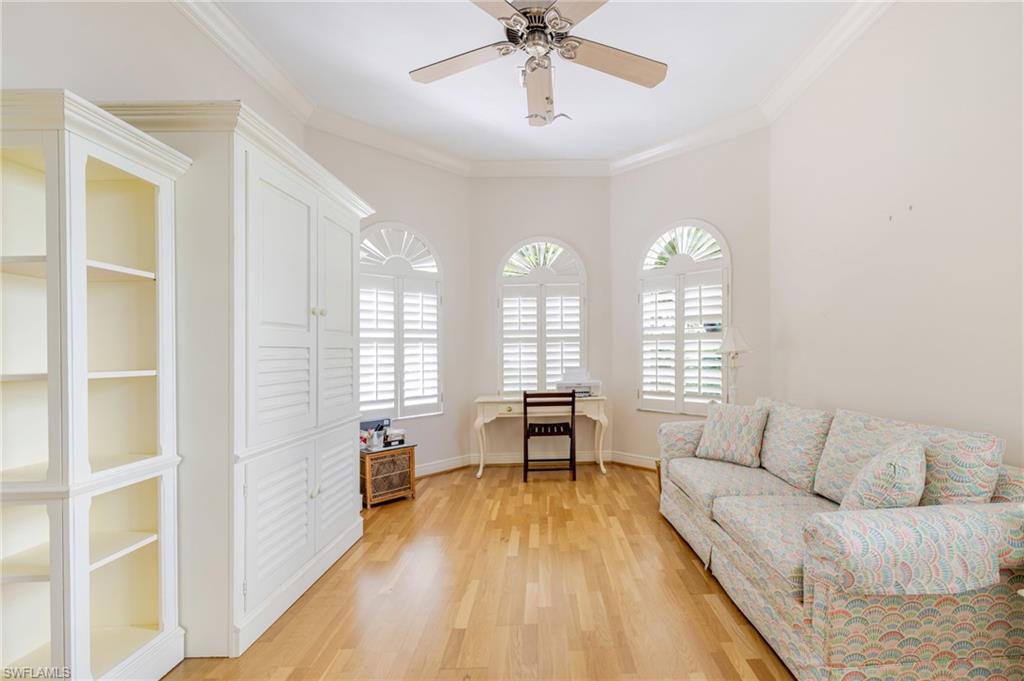 20481 Chapel Trace Estero, FL 33928 - Photo 14 of 50 a living room with furniture and a large window