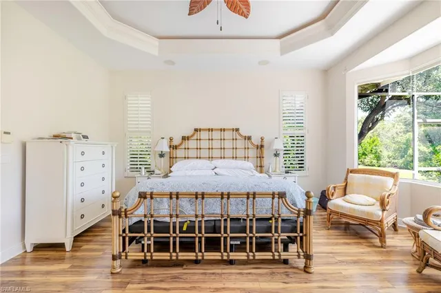 a bedroom with furniture and windows