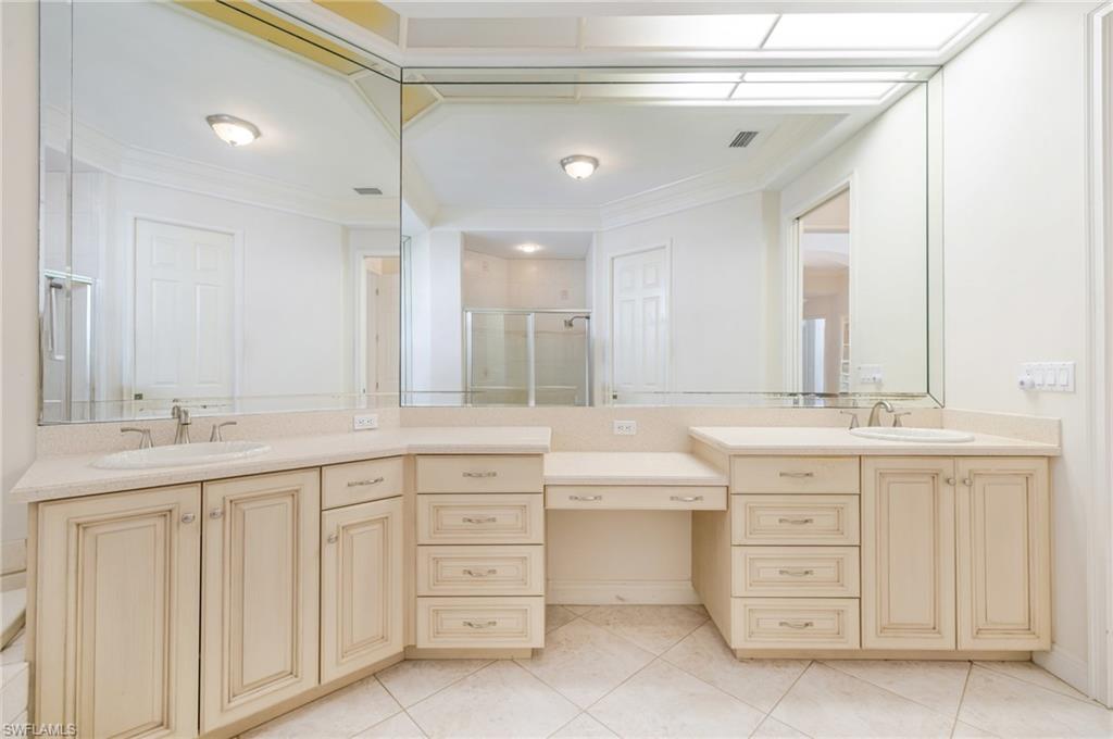 20481 Chapel Trace Estero, FL 33928 - Photo 20 of 50 a bathroom with double sink and a mirror