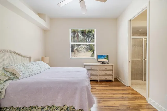 a room with a bed and a window