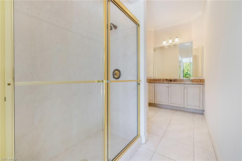 20481 Chapel Trace Estero, FL 33928 - Photo 27 of 50 a bathroom with a shower and a mirror