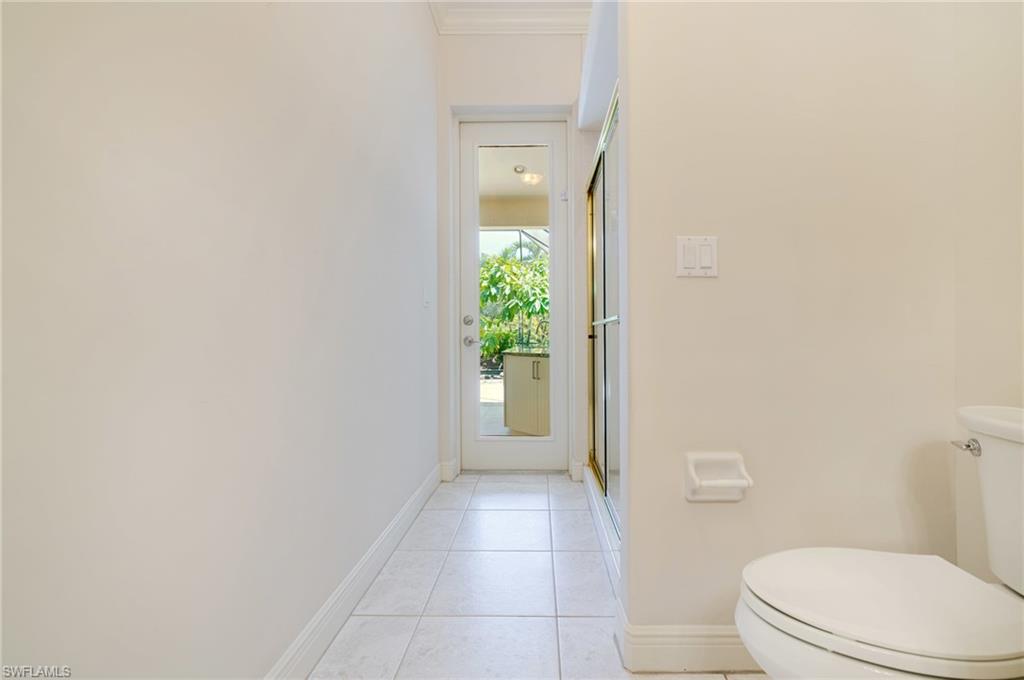 20481 Chapel Trace Estero, FL 33928 - Photo 30 of 50 a bathroom with a toilet