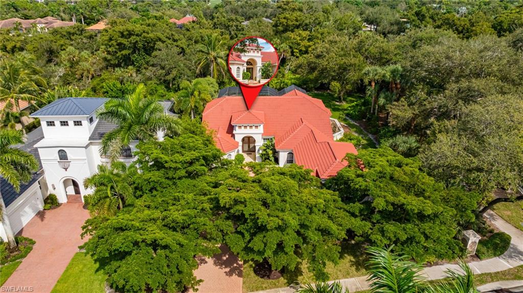 20481 Chapel Trace Estero, FL 33928 - Photo 39 of 50 a aerial view of a house with a yard and large trees
