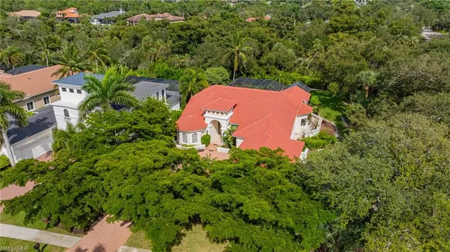 an aerial view of a house with yard and outdoor space